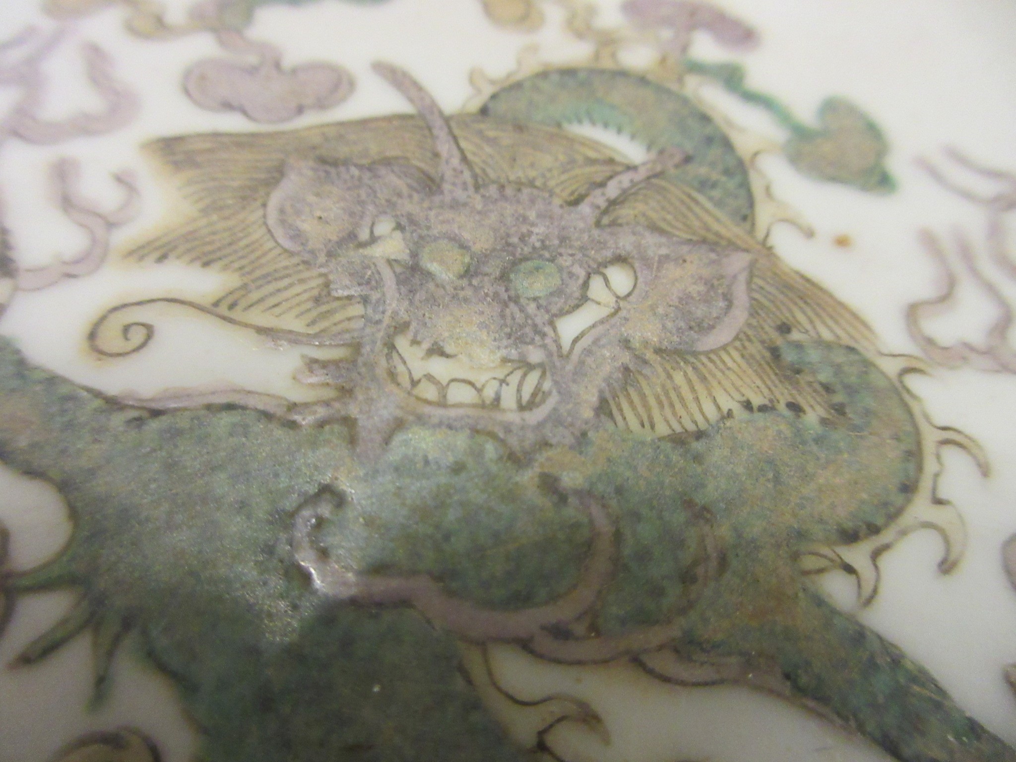 A CHINESE PORCELAIN FAMILLE VERTE BOWL of plain circular form painted with a seated Hotei with Image