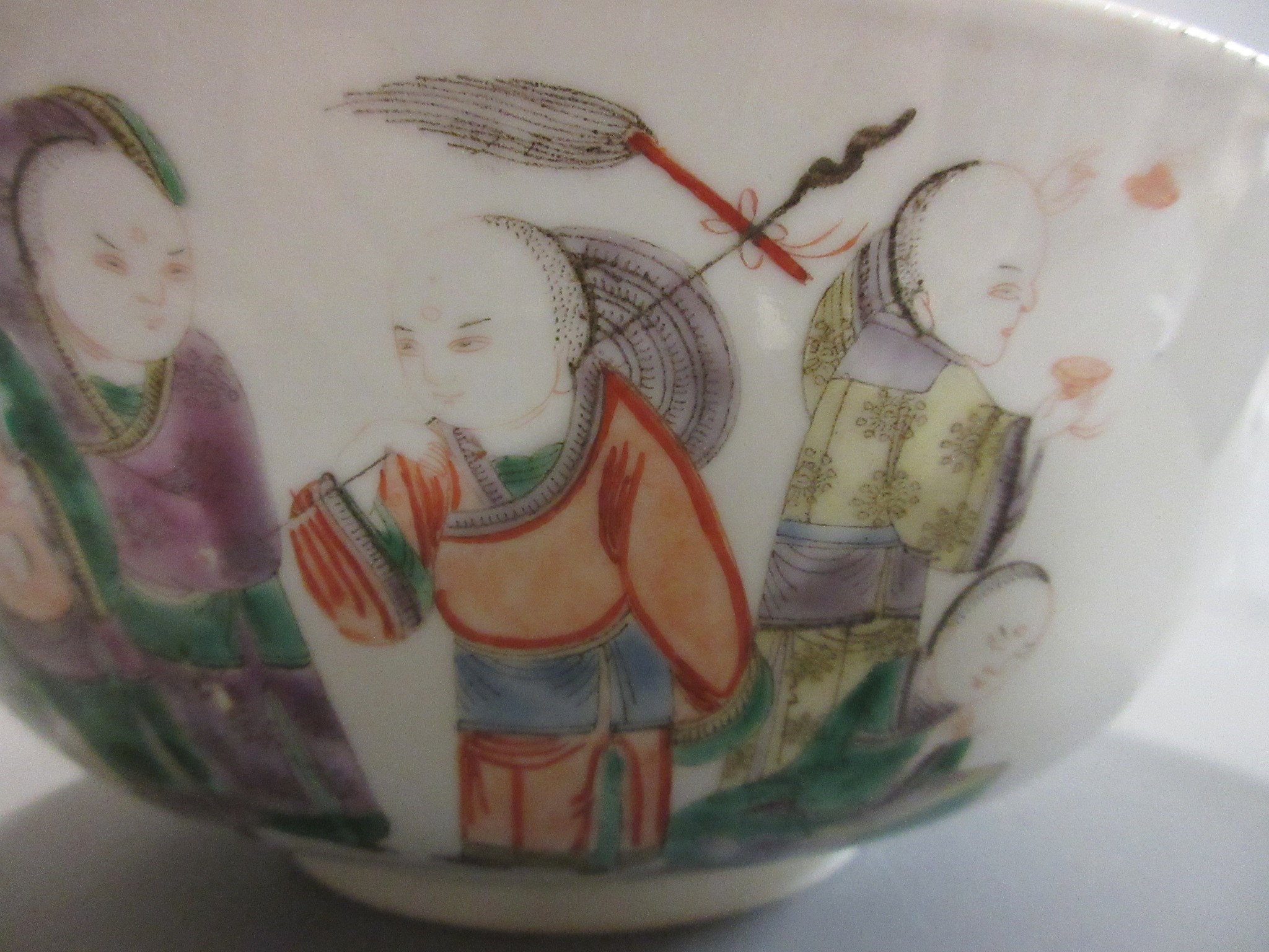 A CHINESE PORCELAIN FAMILLE VERTE BOWL of plain circular form painted with a seated Hotei with Image