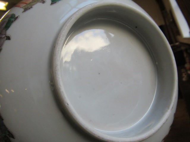 A CHINESE PORCELAIN FAMILLE VERTE BOWL of plain circular form painted with a seated Hotei with Image