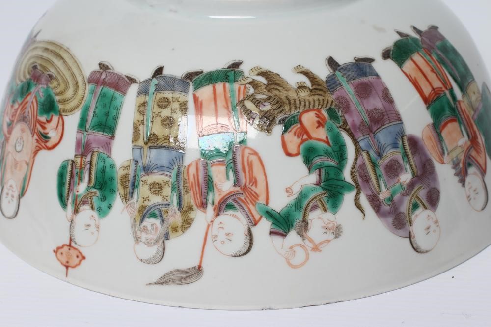 A CHINESE PORCELAIN FAMILLE VERTE BOWL of plain circular form painted with a seated Hotei with Image