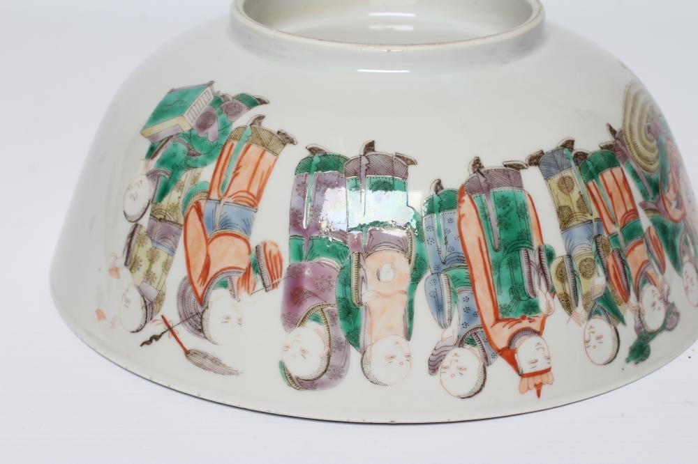 A CHINESE PORCELAIN FAMILLE VERTE BOWL of plain circular form painted with a seated Hotei with Image