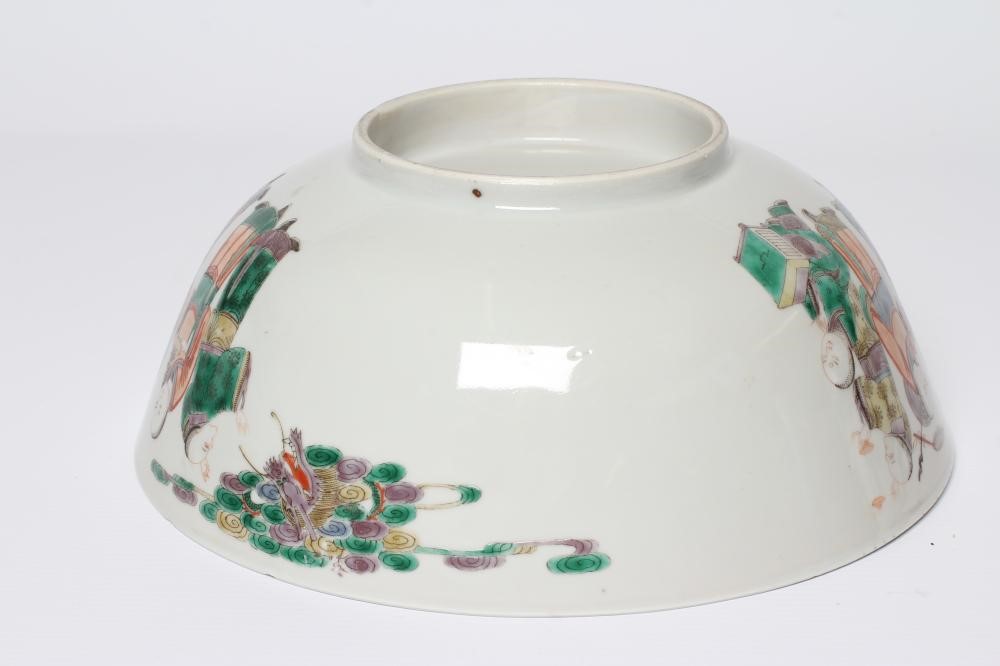 A CHINESE PORCELAIN FAMILLE VERTE BOWL of plain circular form painted with a seated Hotei with Image