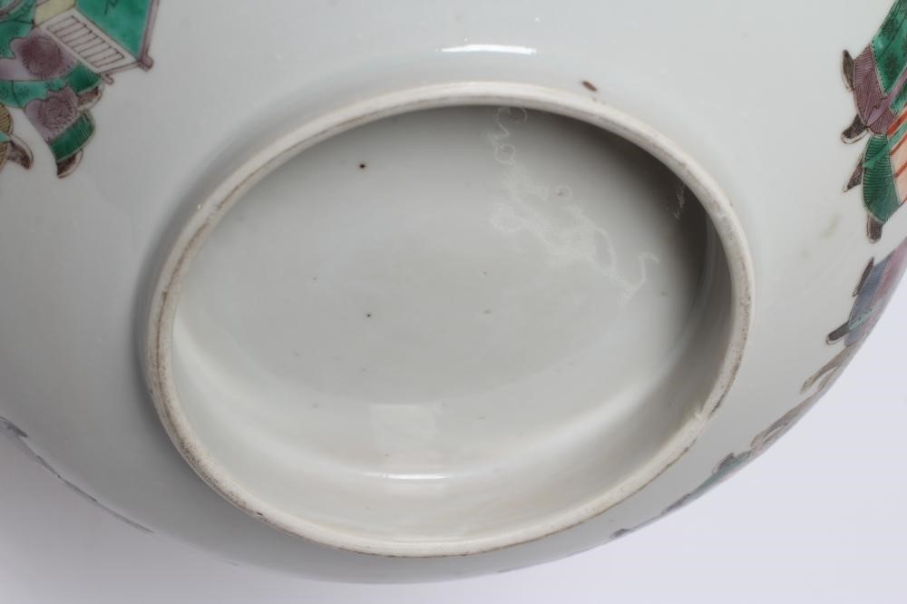 A CHINESE PORCELAIN FAMILLE VERTE BOWL of plain circular form painted with a seated Hotei with Image