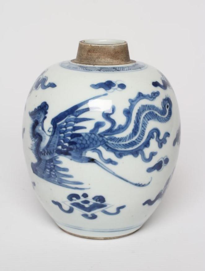 A CHINESE PORCELAIN JAR of ovoid form, painted in underglaze blue with two dragons chasing the Image