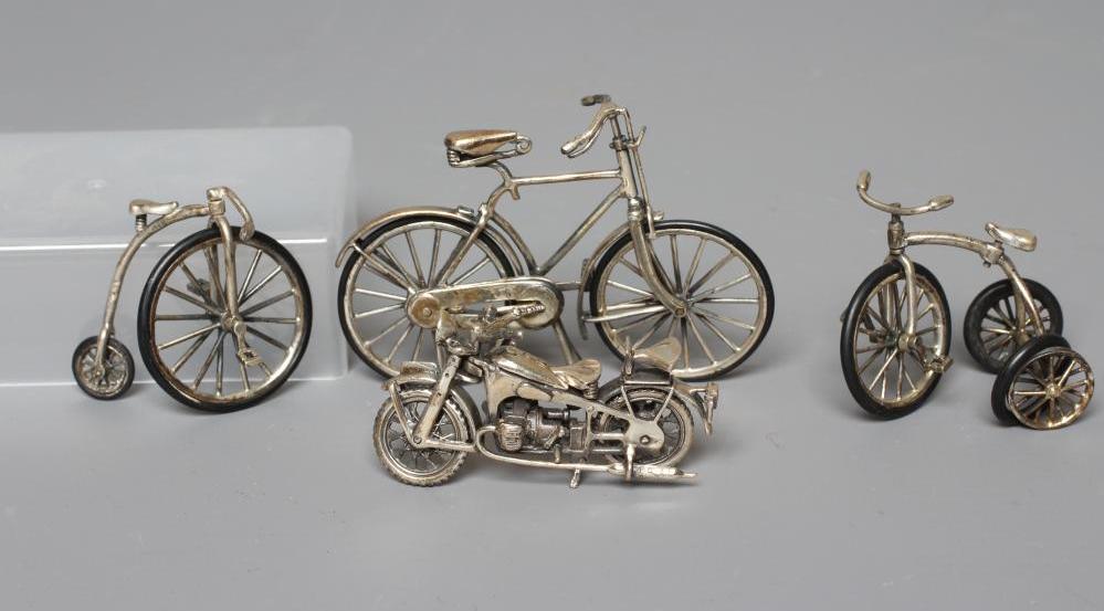 A MODERN SILVER MINIATURE MODEL PENNYFARTHING Image
