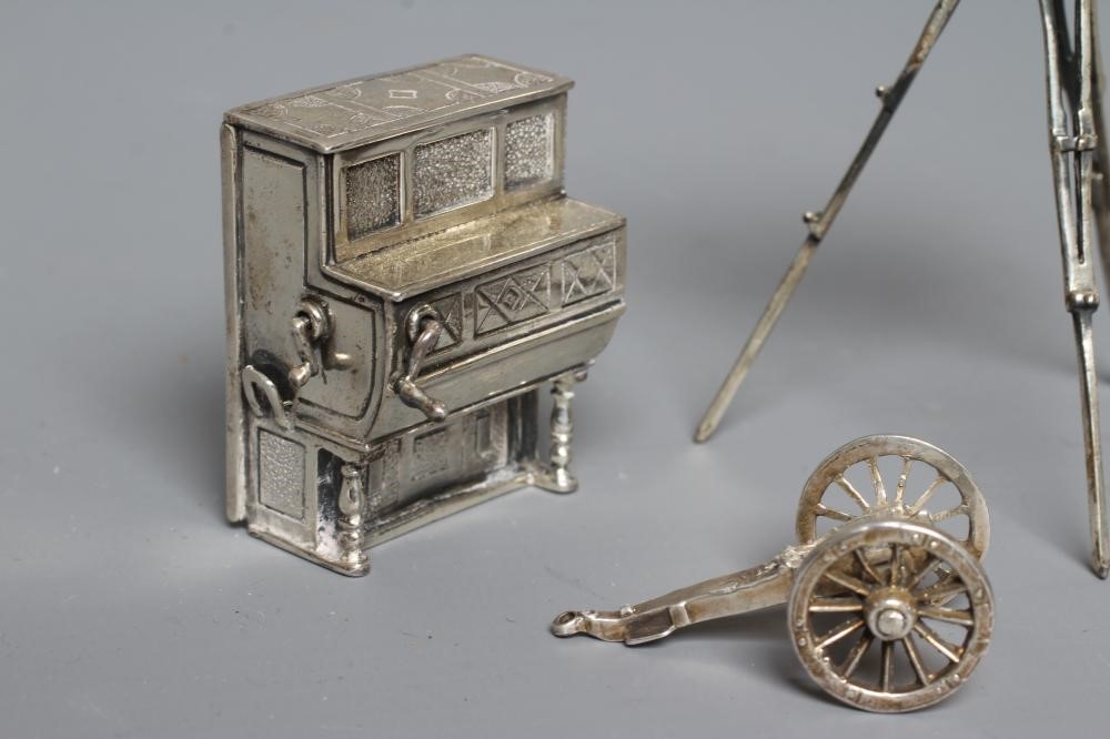 A MODERN SILVER MINIATURE MODEL TRIPOD PLATE CAMERA Image