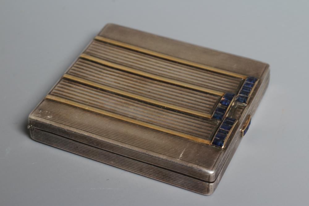 AN ART DECO SILVER COMPACT imported by Stockwell & Co. Image