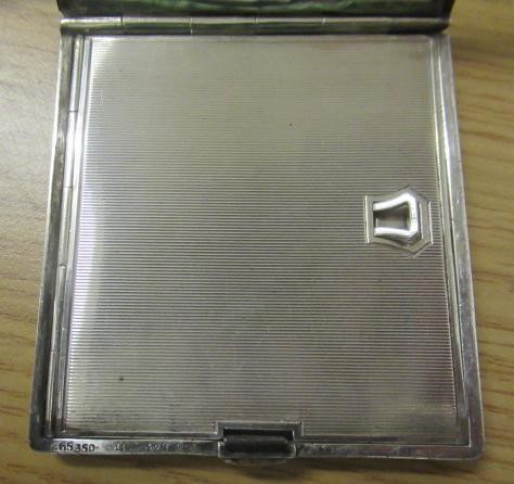 AN ART DECO SILVER COMPACT imported by Stockwell & Co. Image