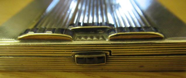 AN ART DECO SILVER COMPACT imported by Stockwell & Co. Image