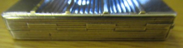 AN ART DECO SILVER COMPACT imported by Stockwell & Co. Image