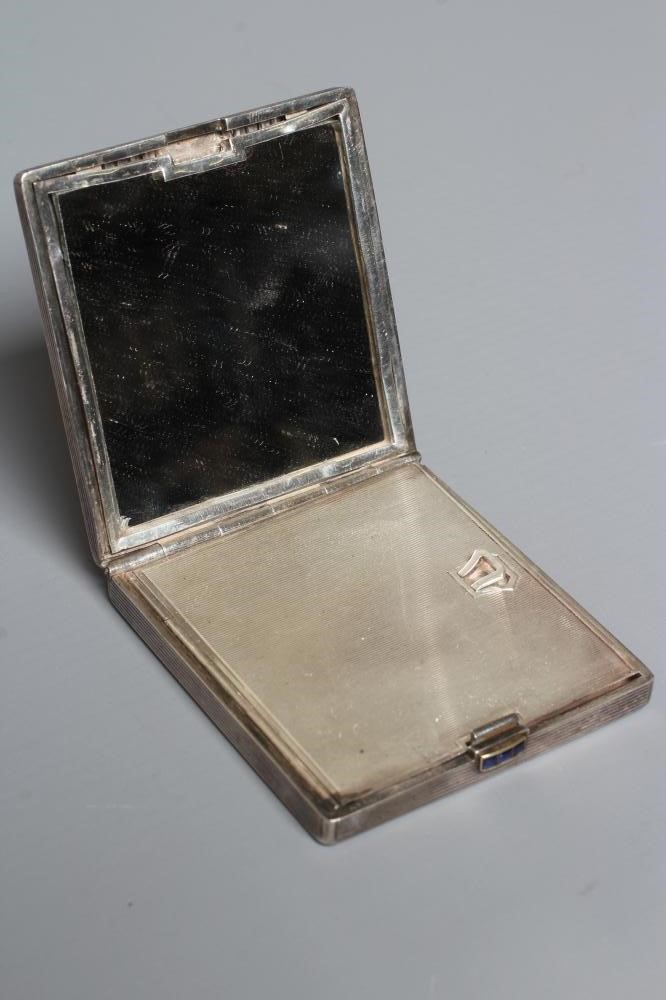 AN ART DECO SILVER COMPACT imported by Stockwell & Co. Image