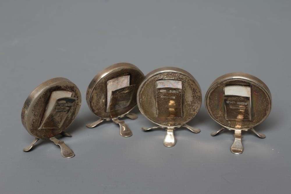 A SET OF FOUR EDWARDIAN NOVELTY SILVER MENU HOLDERS by Grey & Co. Image