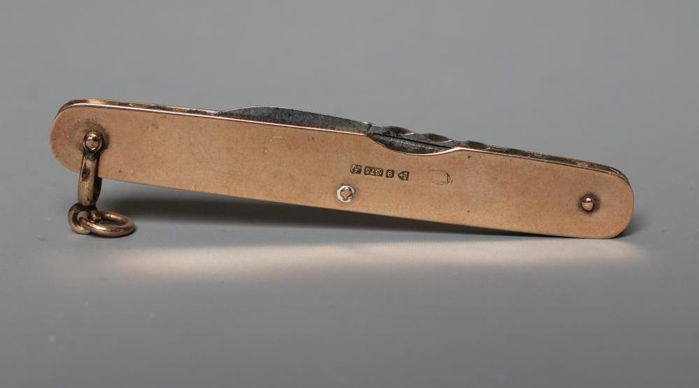 A LATE VICTORIAN 9CT GOLD CASED PEN KNIFE by William Turner & Co., Chester 1901, with two hinged Image
