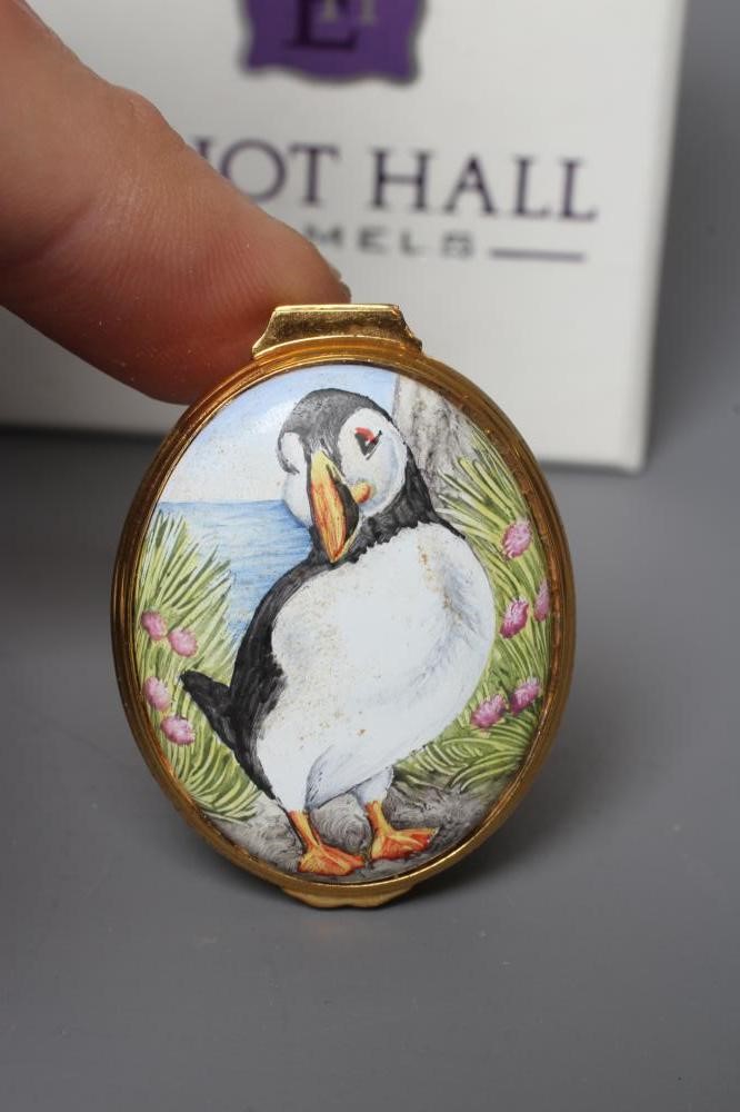THREE ELLIOT HALL ENAMEL BOXES comprising a cylindrical box painted by Marie Graves with Puffins Image