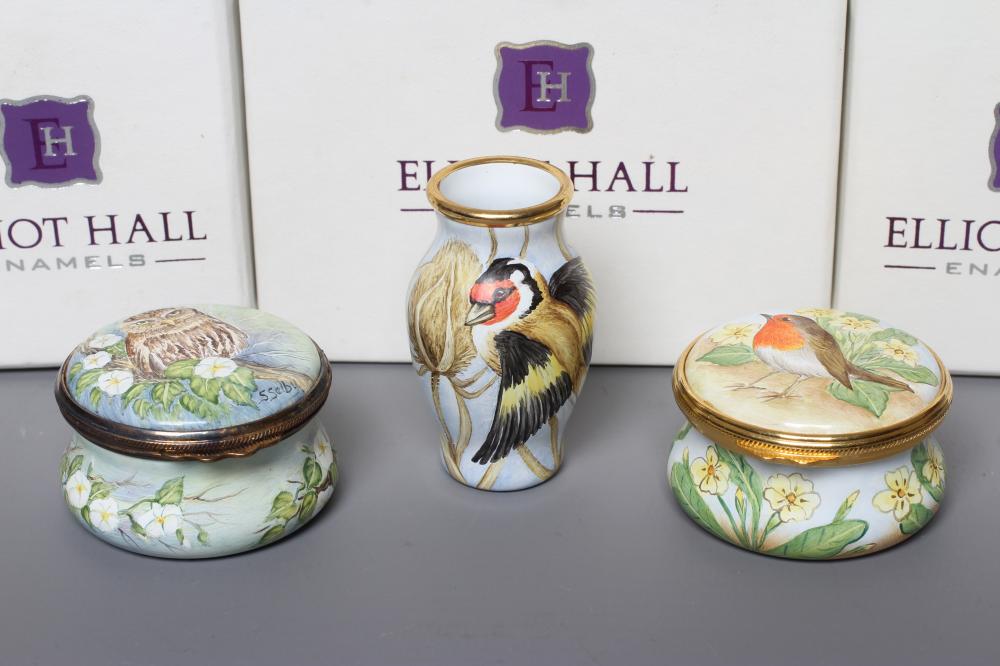 TWO ELLIOT HALL ENAMEL BOXES each of circular form and painted by Sandra Selby with a Robin and Image