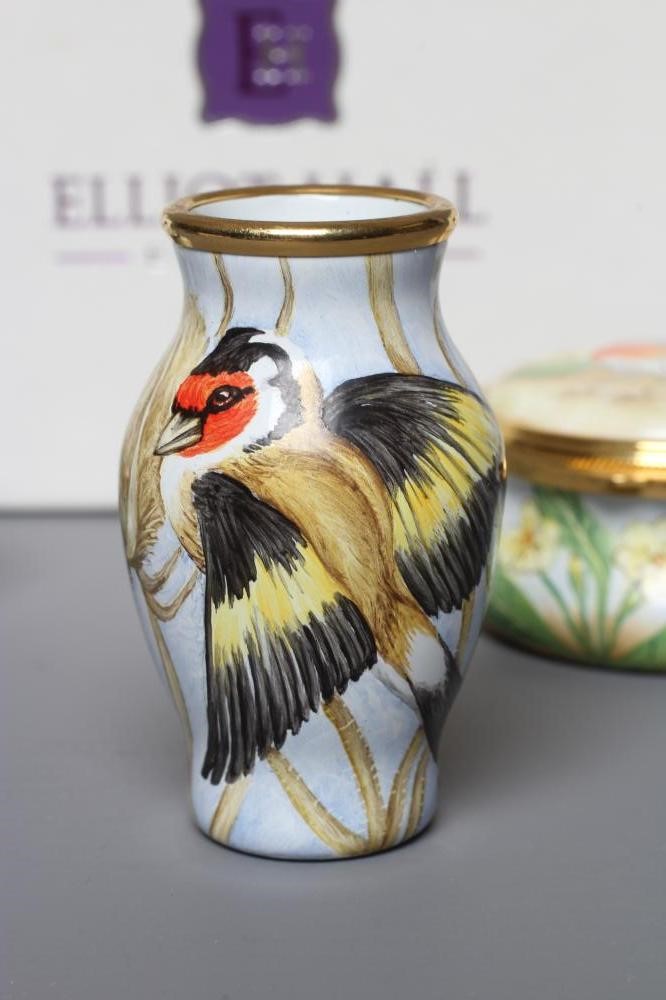 TWO ELLIOT HALL ENAMEL BOXES each of circular form and painted by Sandra Selby with a Robin and Image