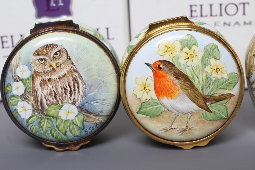 TWO ELLIOT HALL ENAMEL BOXES each of circular form and painted by Sandra Selby with a Robin and Image
