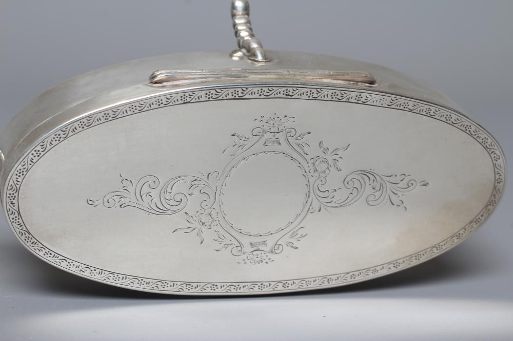 A SILVER OVAL DRESSING TABLE BOX by Hasset & Harper Ltd. Image