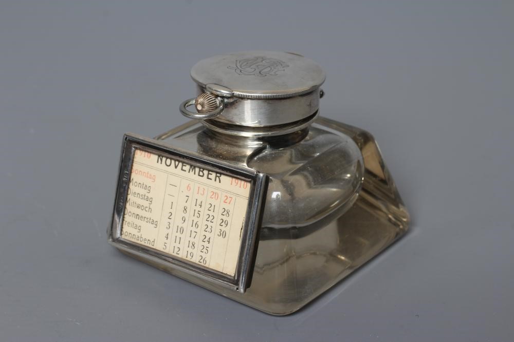 AN EDWARDIAN SILVER MOUNTED COMBINATION INKWELL/PERPETUAL CALENDAR AND WATCH HOLDER by John Grinsell Image