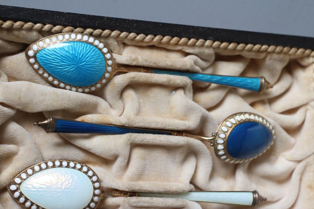 A HARLEQUIN SET OF SIX NORWEGIAN SILVER GILT COFFEE SPOONS Image