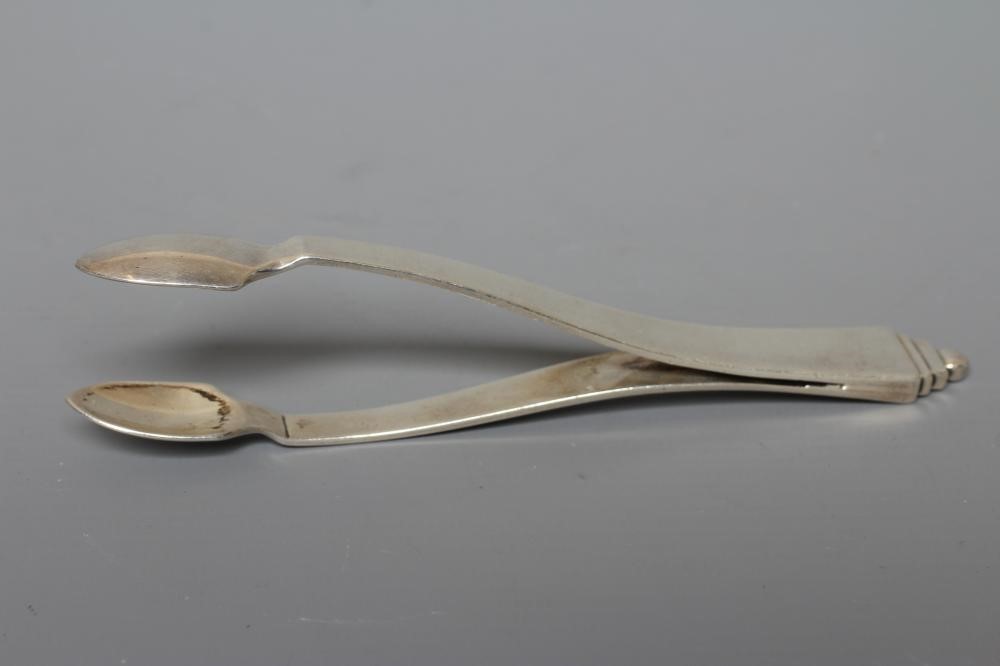 A PAIR OF GEORG JENSEN SILVER PYRAMID PATTERN SUGAR TONGS imported by Stockwell & Co., London 1929, Image