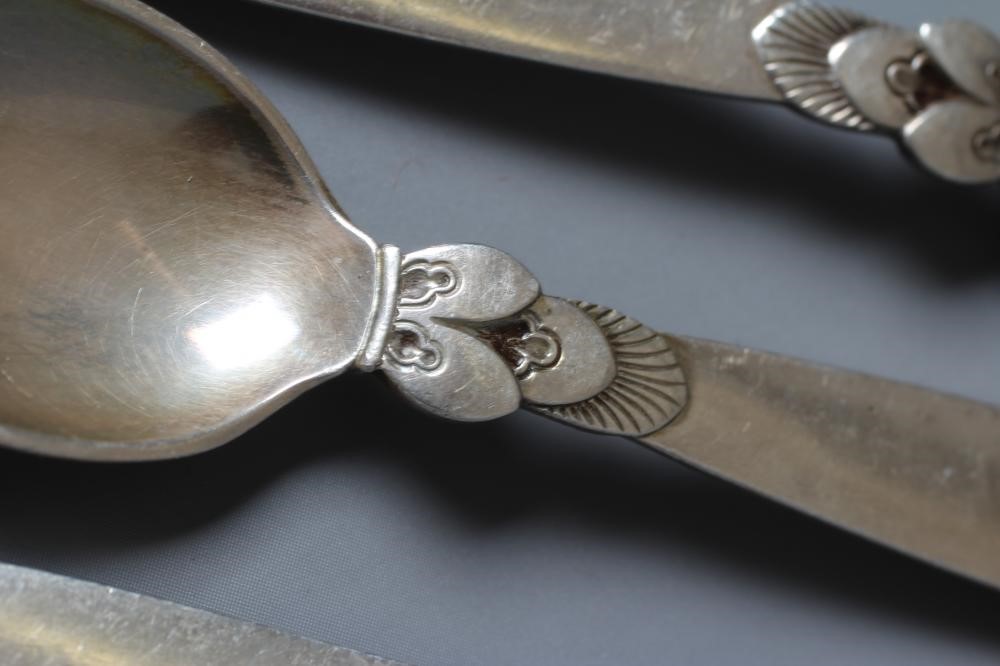 A SET OF SIX GEORG JENSEN SILVER CACTUS COFFEE SPOONS, London import 1938, 4" long, 3ozs total (Est. Image