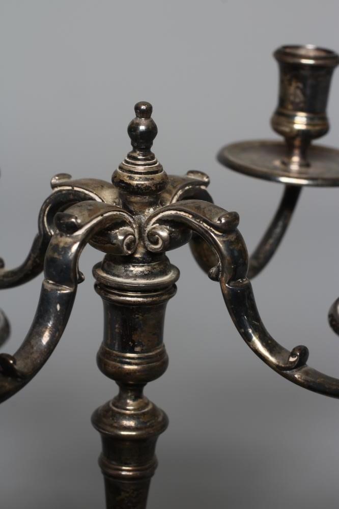 A GEORGE I STYLE SILVER CANDLESTICK by C J Vander Image
