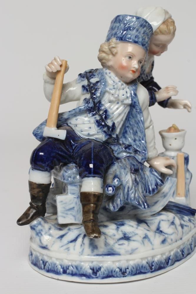 A CRISTOFORO PORCELAIN FIGURE GROUP ALLEGORICAL OF WINTER Image