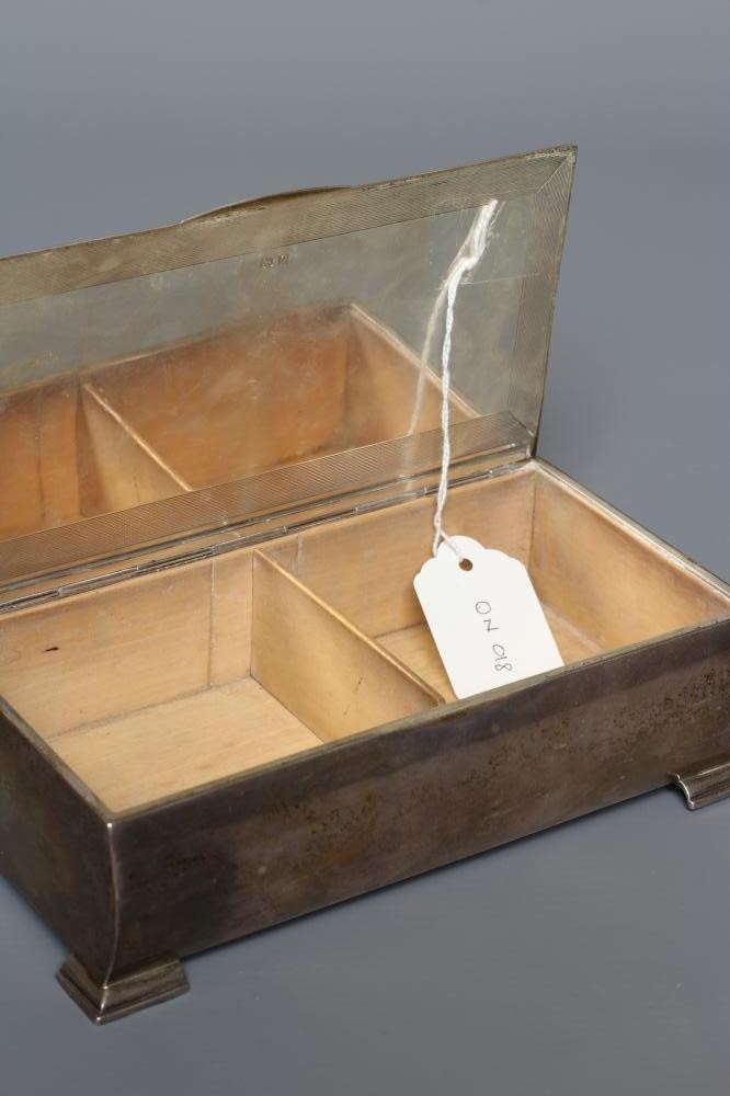AN ART DECO SILVER CIGARETTE BOX by John Rose, Birmingham 1938 Image