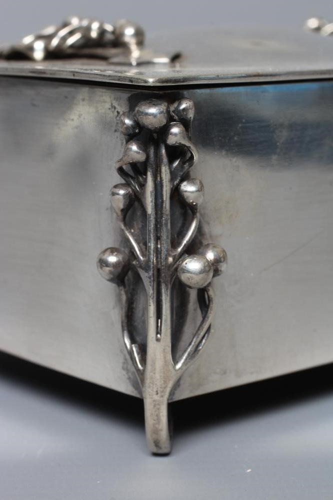 AN EDWARDIAN ARTS AND CRAFTS SILVER CIGARETTE CASKET by William Hutton Image