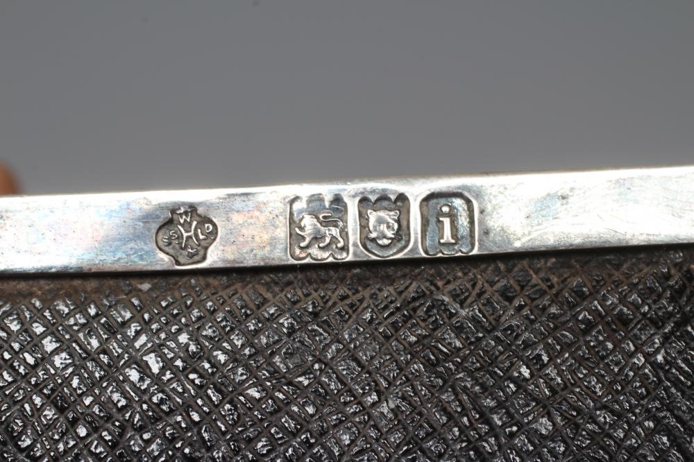 AN EDWARDIAN ARTS AND CRAFTS SILVER CIGARETTE CASKET by William Hutton Image