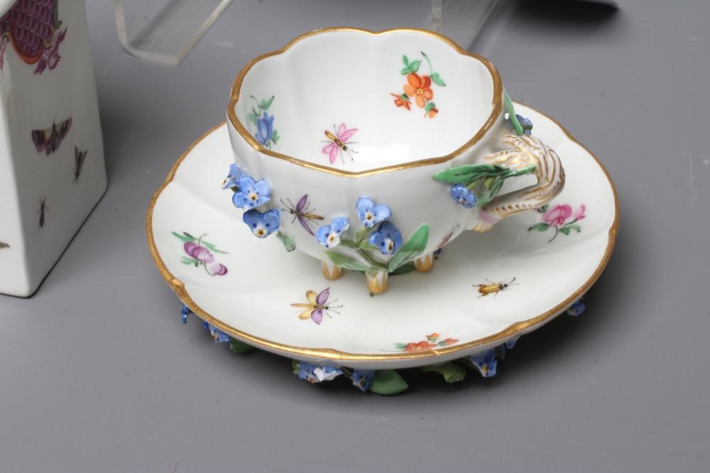 A COLLECTION OF CONTINENTAL PORCELAIN comprising a flower encrusted Meissen cabinet cup and saucer Image