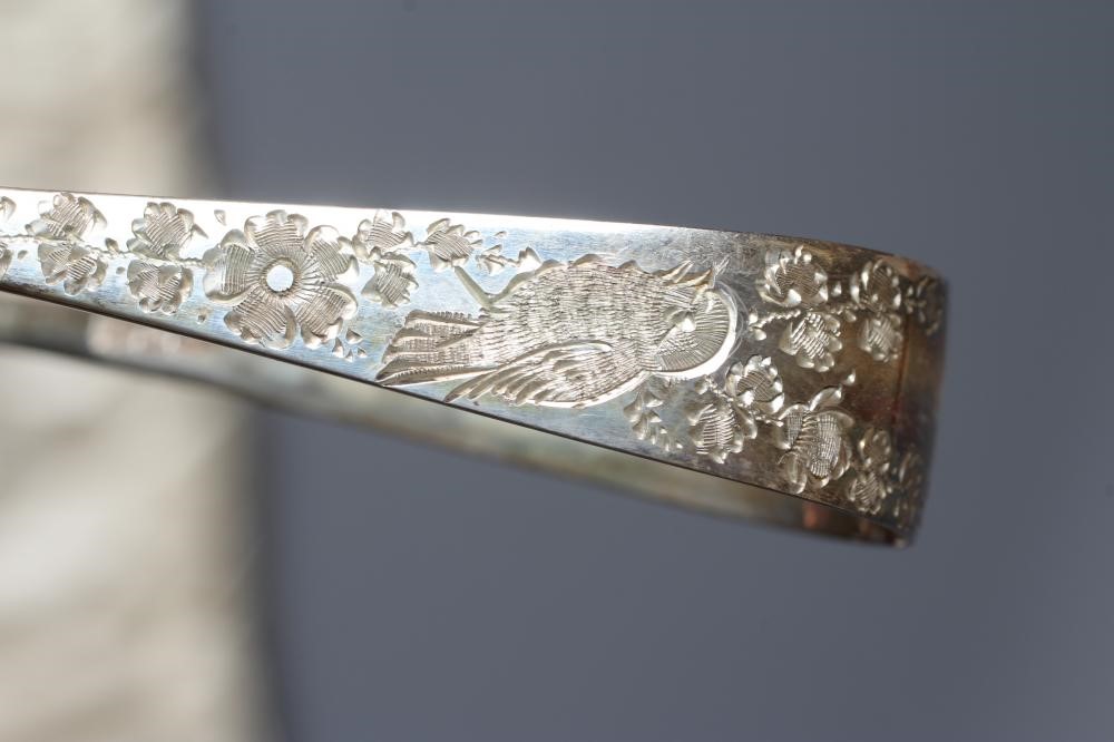 A SET OF TWELVE EDWARDIAN SILVER TEASPOONS AND MATCHING SUGAR TONGS by Wakely & Wheeler Image