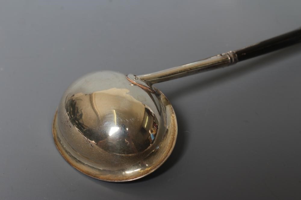 A GEORGE III SILVER TODDY LADLE Image