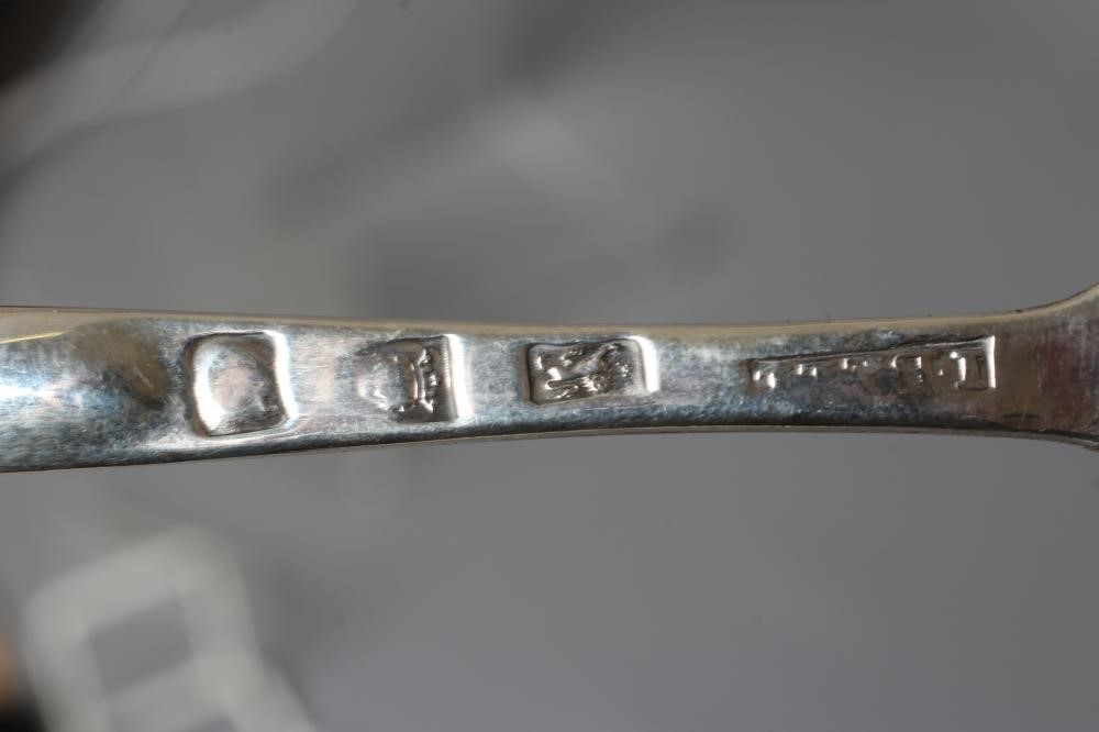 A GEORGE III SILVER MARROW SCOOP by Joseph Bell II, London 1760, with shell back, 8 1/2" long, 1oz Image