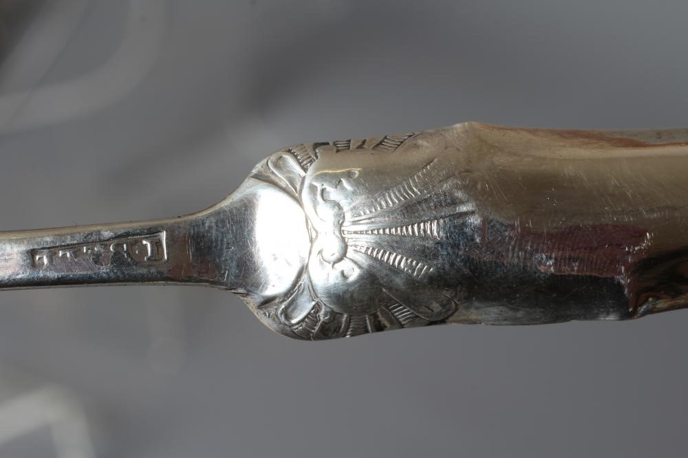 A GEORGE III SILVER MARROW SCOOP by Joseph Bell II, London 1760, with shell back, 8 1/2" long, 1oz Image