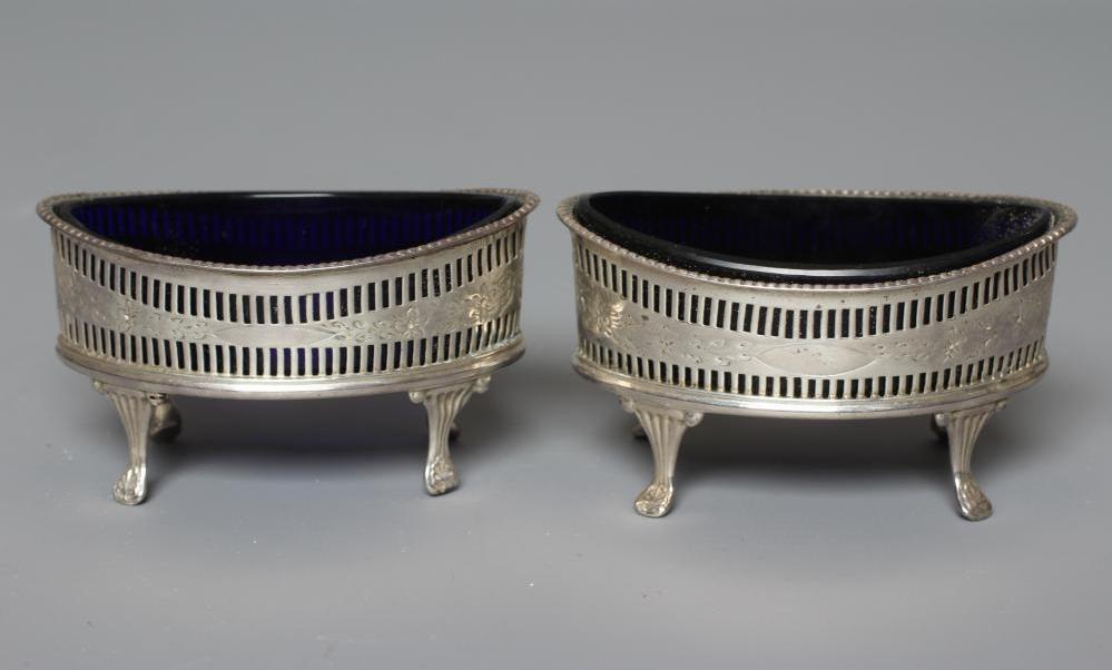 A PAIR OF LATE VICTORIAN SILVER NAVETTE SALTS by Thomas Hayes Image