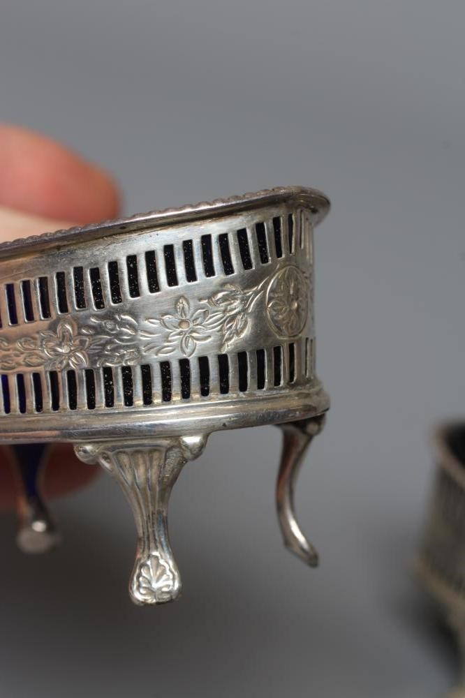A PAIR OF LATE VICTORIAN SILVER NAVETTE SALTS by Thomas Hayes Image