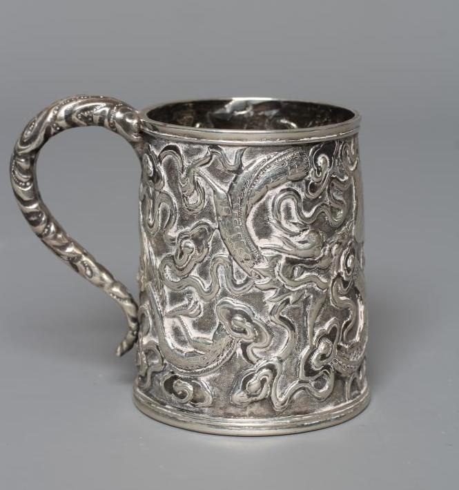 A CHINESE EXPORT SILVER CHRISTENING MUG by Kwong Man Shing (act.1875-1925) Image