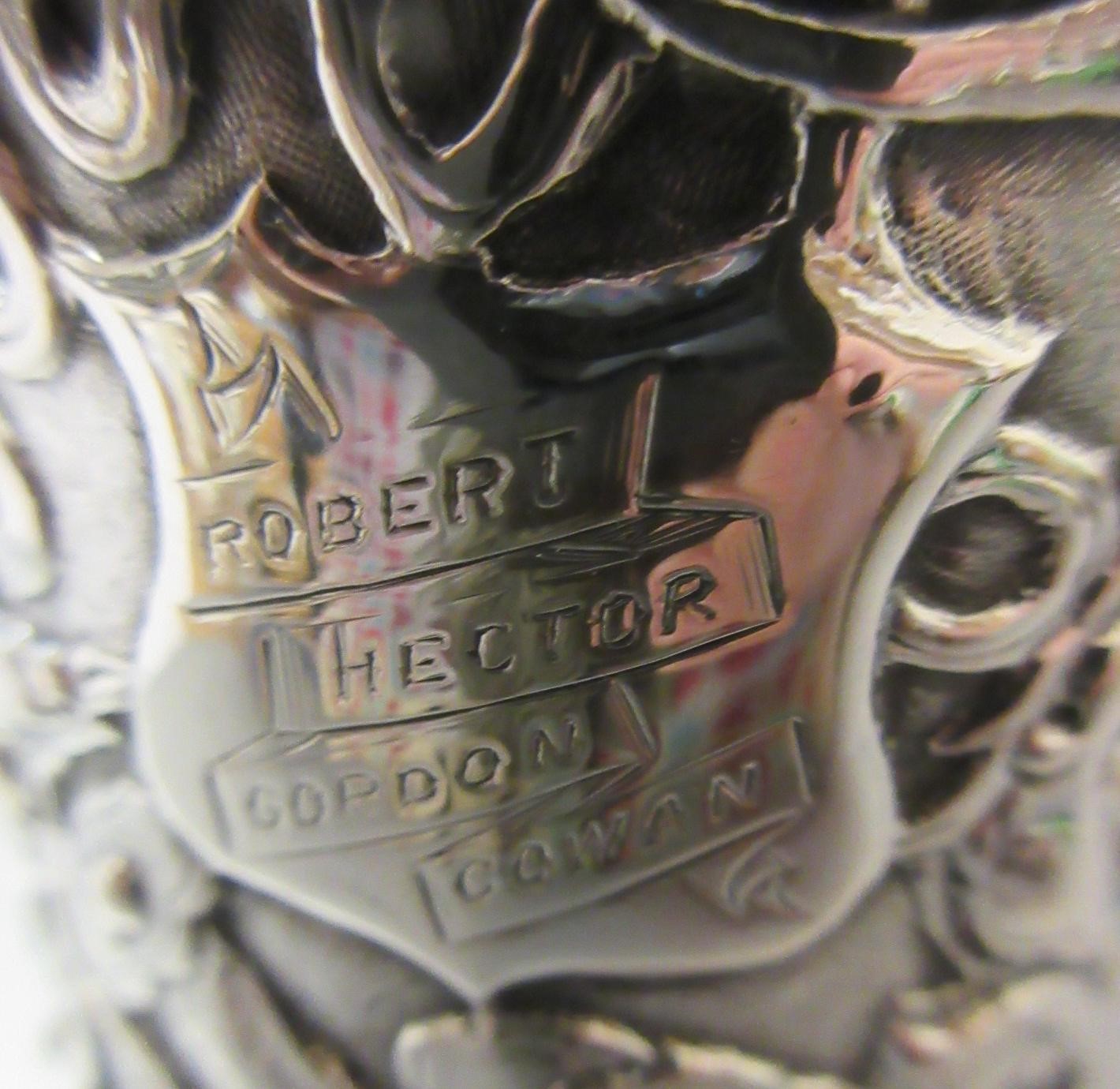 A CHINESE EXPORT SILVER CHRISTENING MUG by Kwong Man Shing (act.1875-1925) Image