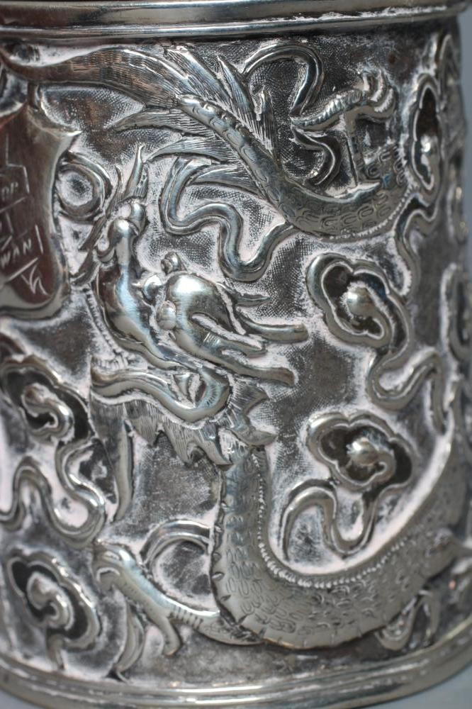 A CHINESE EXPORT SILVER CHRISTENING MUG by Kwong Man Shing (act.1875-1925) Image