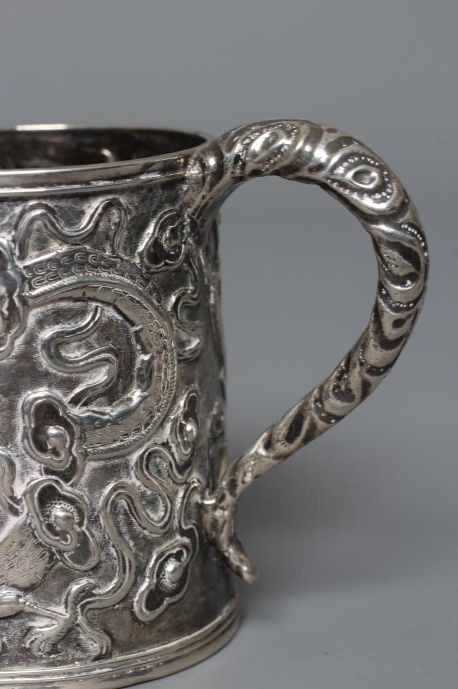 A CHINESE EXPORT SILVER CHRISTENING MUG by Kwong Man Shing (act.1875-1925) Image