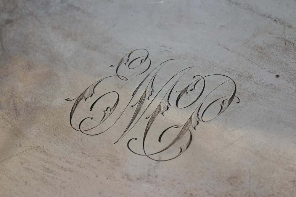 A SILVER DRESSING TABLE TRAY, maker's mark rubbed, Birmingham 1914, of lobed oval form centrally Image