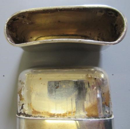 A SILVER HIP FLASK by G & J W Hawksley, Sheffield 1931, of plain rounded oblong form with pull-off Image