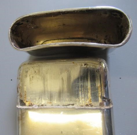 A SILVER HIP FLASK by G & J W Hawksley, Sheffield 1931, of plain rounded oblong form with pull-off Image