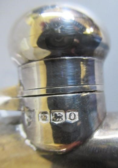 A SILVER HIP FLASK by G & J W Hawksley, Sheffield 1931, of plain rounded oblong form with pull-off Image