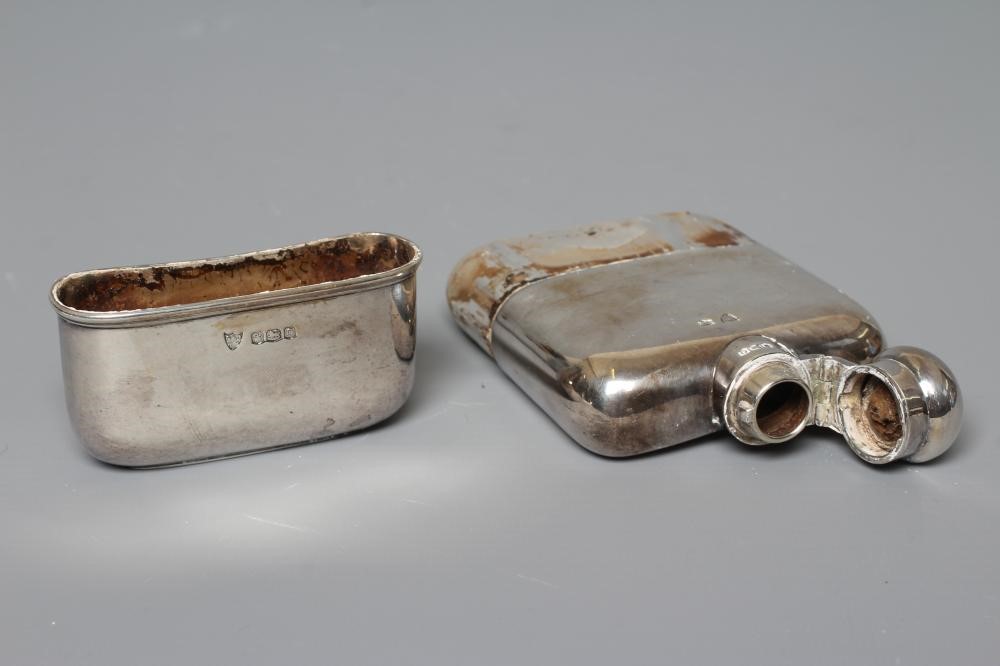 A SILVER HIP FLASK by G & J W Hawksley, Sheffield 1931, of plain rounded oblong form with pull-off Image