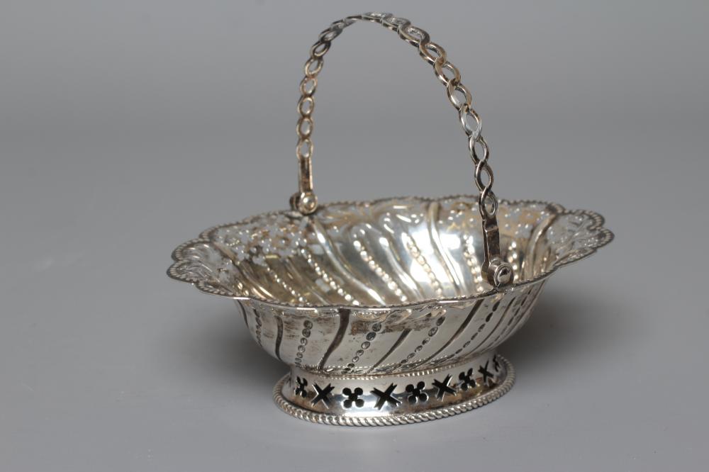 A GEORGE III SILVER EPERGNE BASKET by Charles Aldridge & Henry Green Image