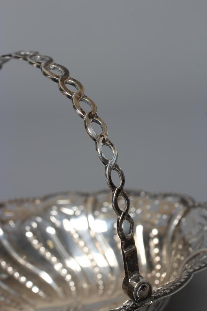 A GEORGE III SILVER EPERGNE BASKET by Charles Aldridge & Henry Green Image