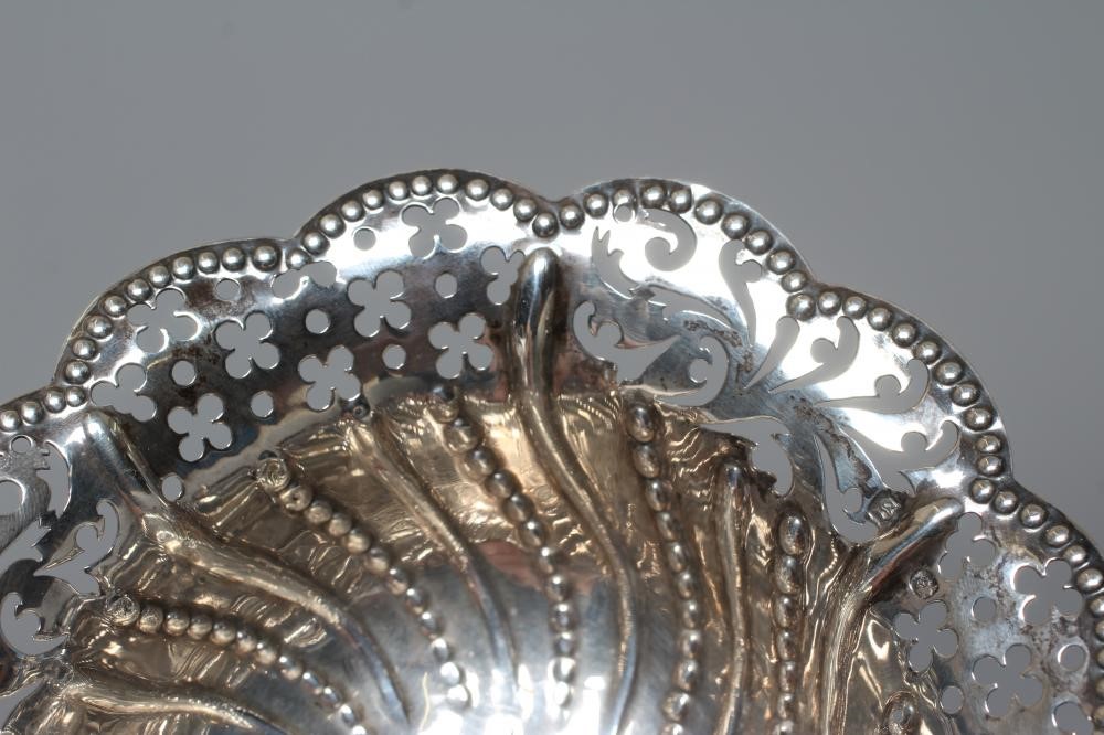 A GEORGE III SILVER EPERGNE BASKET by Charles Aldridge & Henry Green Image